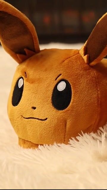 Stay cozy and show off your love for Pokémon with these adorable Eevee Adult Slippers. Perfect for lounging around, these slippers add a playful touch to your casual wear.