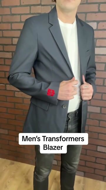 Elevate your style with our exclusive Men's Transformers Blazer, where fashion meets fandom! This sleek blazer features subtle nods to the iconic Transformers franchise and is perfect for any fan that wants to show their passion in a sophisticated way!